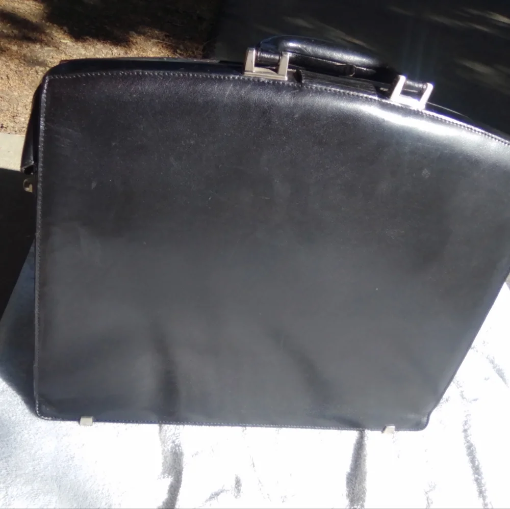 Classic Black Leather Men's Briefcase with Polished Silver Accent